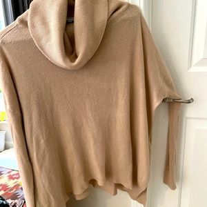 Turtle neck sweater.
